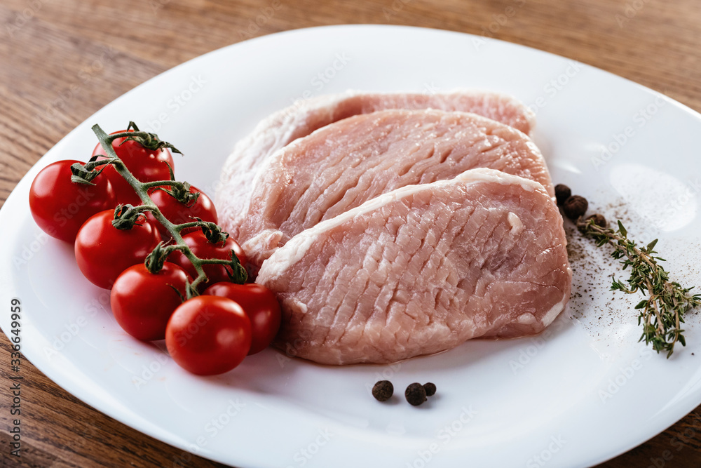 meat with vegetables in white plate. meat with vegetables in white plate.