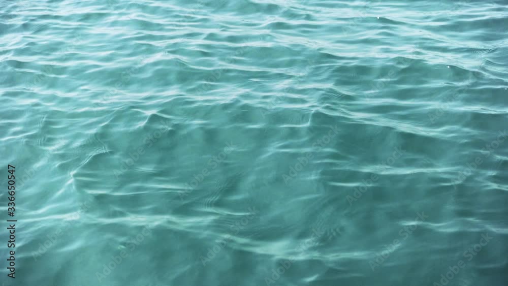 The ripple waves of the sea glittering from the sun The ripple waves of the sea glittering from the sun