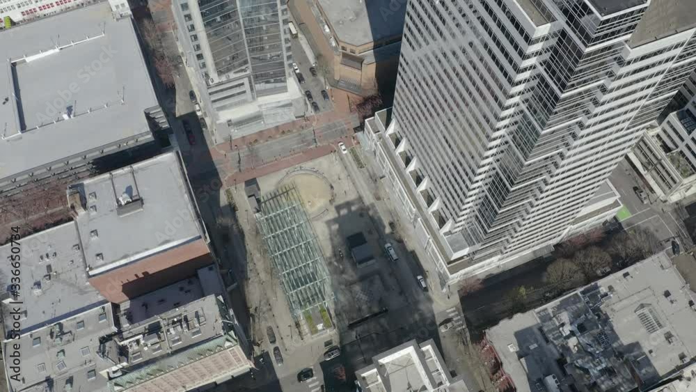 High Aerial View Tilts Up to Reveal Downtown Portland Oregon including Pioneer Square and U.S. Bancorp Tower