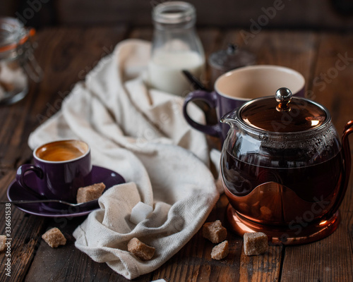 a cup of tea and teapot