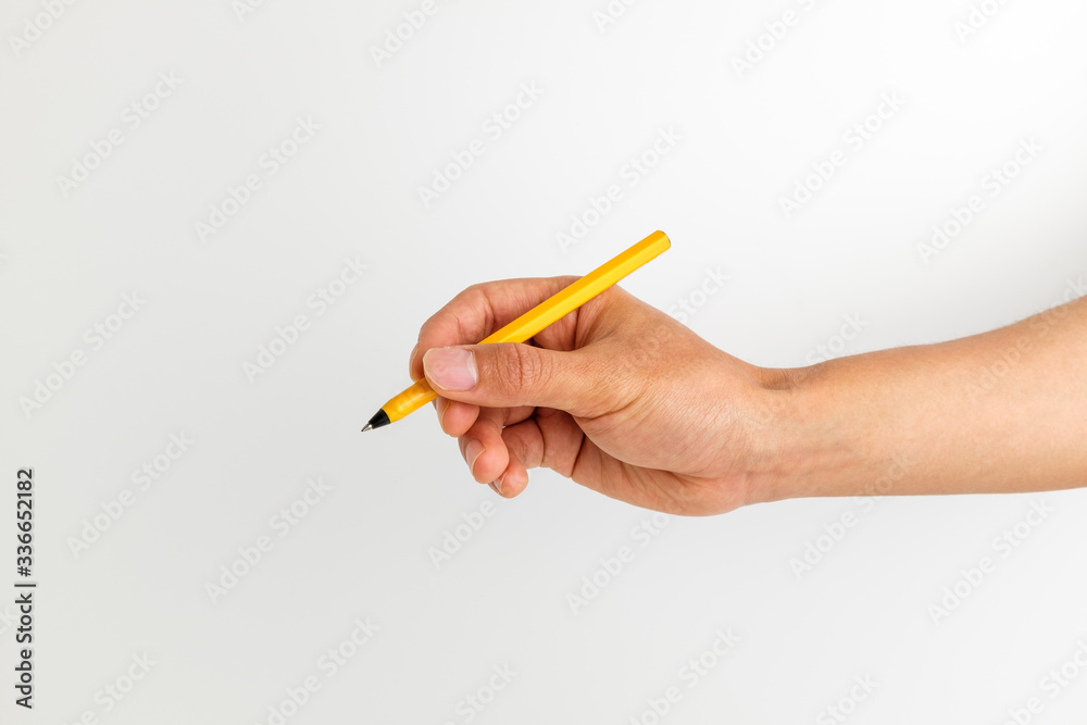 Hand with pen on white background Hand with pen on white background