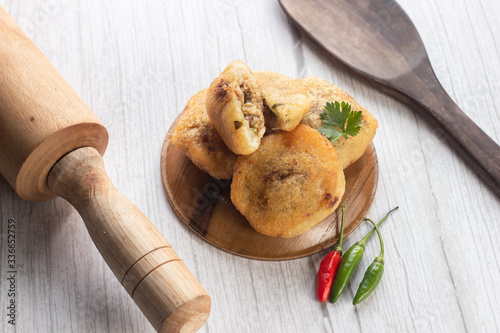 Indonesian Traditional Fritters : Combro, made from deep fried cassava and filled with spice inside