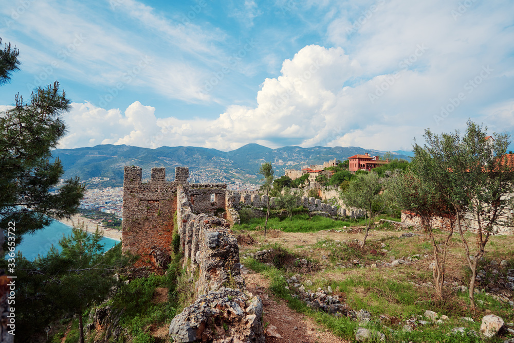 Ancient  wall of the medieval fortress castle of Alanya with sea view, Turkey.