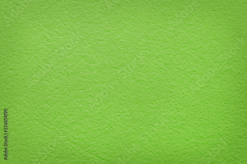 Light green concrete cement wall texture for background and design art work.