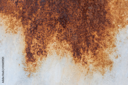 Rust texture on white surface close up view