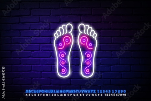 reflexotherapy zone logo with neon sign effect. Foot massage neon sign with text. Vector illustration photo