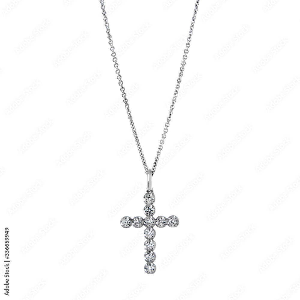 Cross pendant on a white gold chain with diamonds isolated on a white background Cross pendant on a white gold chain with diamonds isolated on a white background