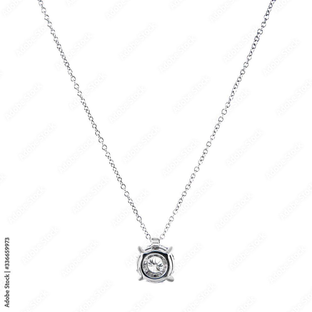 White gold pendant on a chain with diamonds isolated on white background White gold pendant on a chain with diamonds isolated on white background