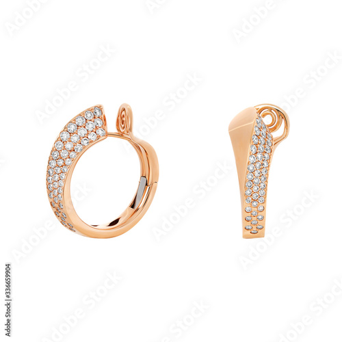 Pink gold earrings with diamonds isolated on white background photo