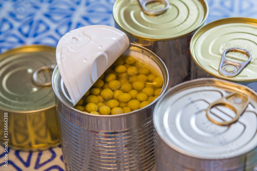 Canned food at home. Green peas in a jar