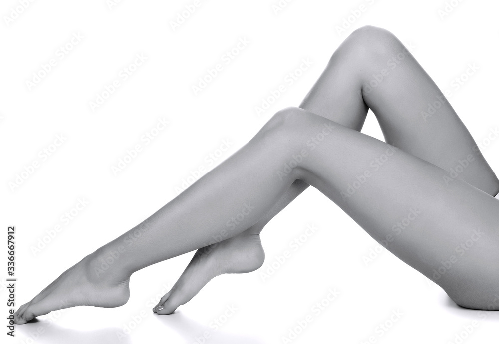 Woman legs on white background Woman legs on white background