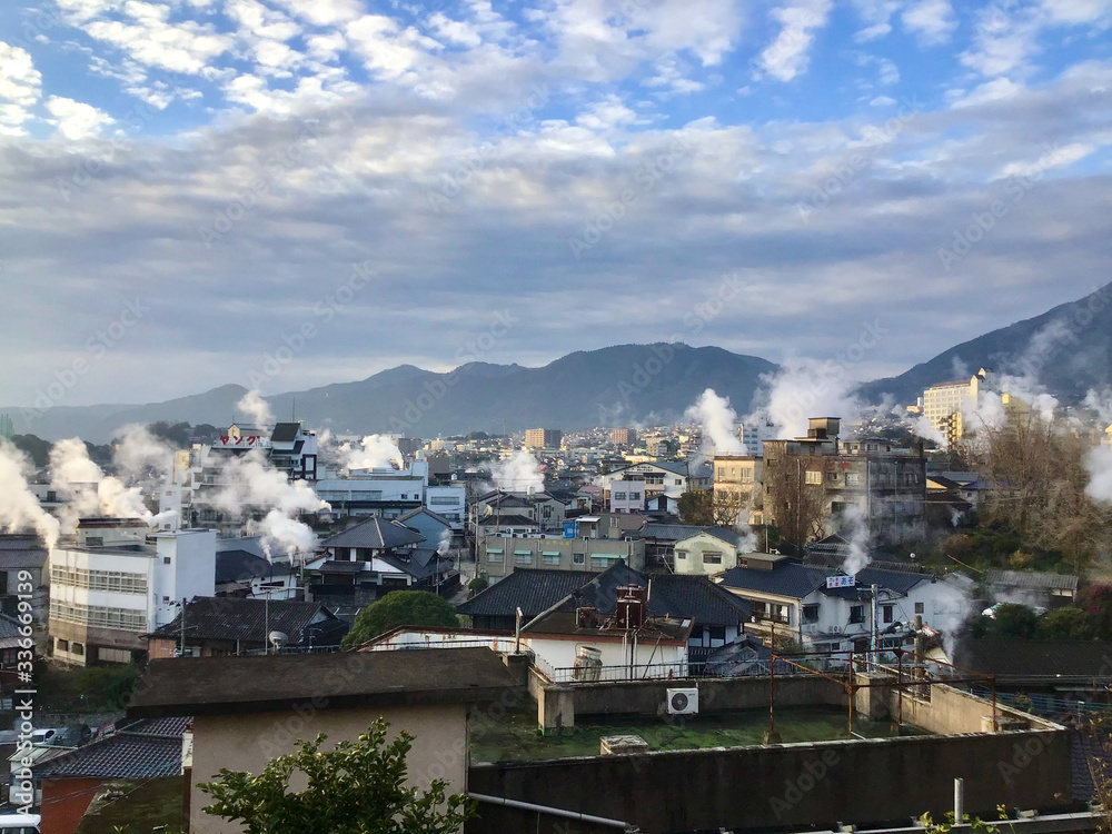 Obraz premium Beppu hot springs with rising steam in Oita
