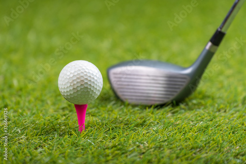 Shot of golf ball with golf club