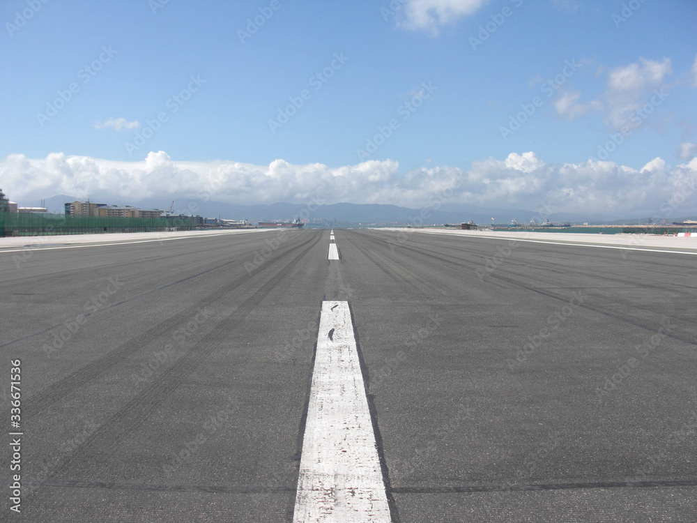 Naklejka premium Road asphalt marking beauty sky and clouds