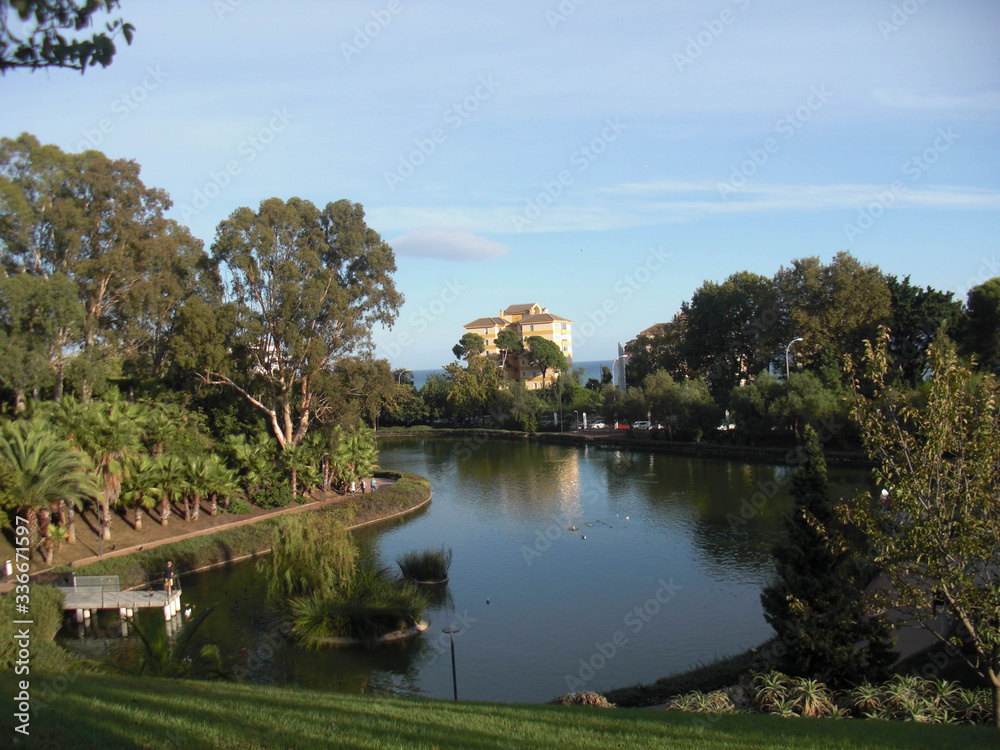 Landscape in city park with lake