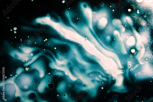 paint spots on the glass highlighted with highlights close up