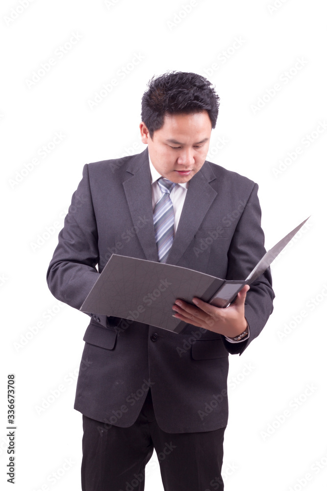 Businessmen are reviewing the file. Businessmen are reviewing the file.