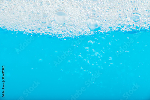Water Splash and Air Bubbles Isolated over White Background.surface of the water