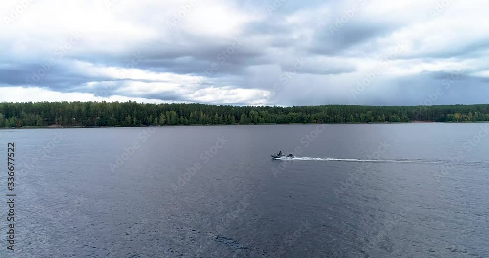 Fishermen are floating on the river. September. Russia 4K Fishermen are floating on the river. September. Russia 4K