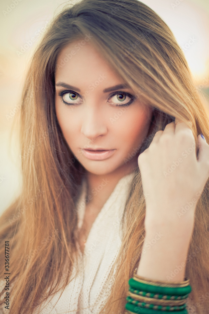 Naklejka premium young pretty women smoothing hair