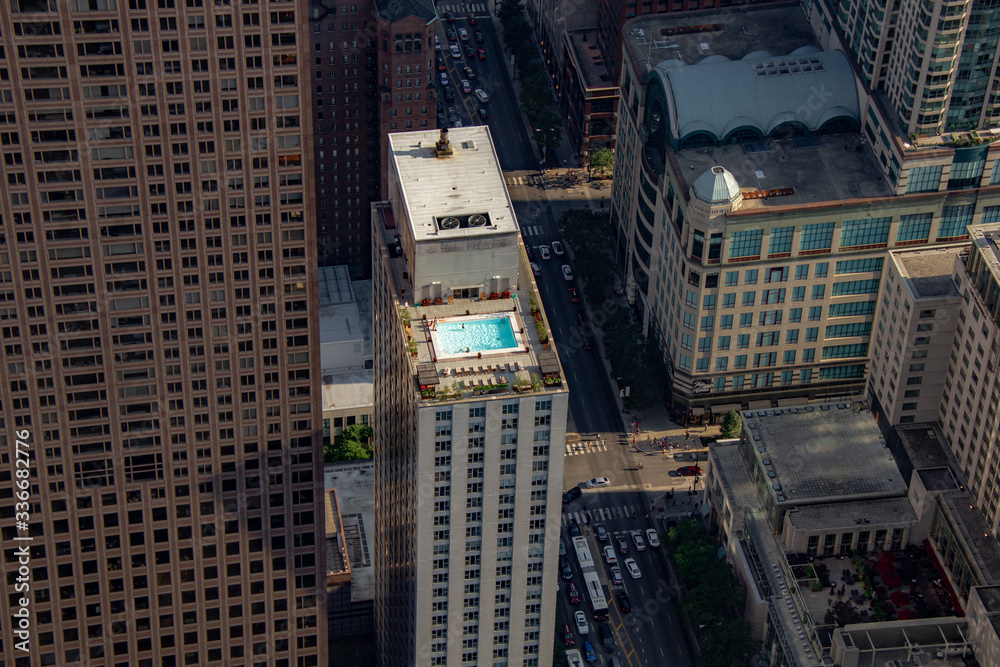 Chicago in summer with clear skies with buildings and greenery Chicago in summer with clear skies with buildings and greenery