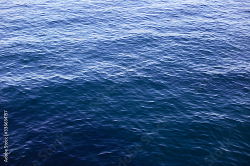 Sea surface. Calm blue shades.