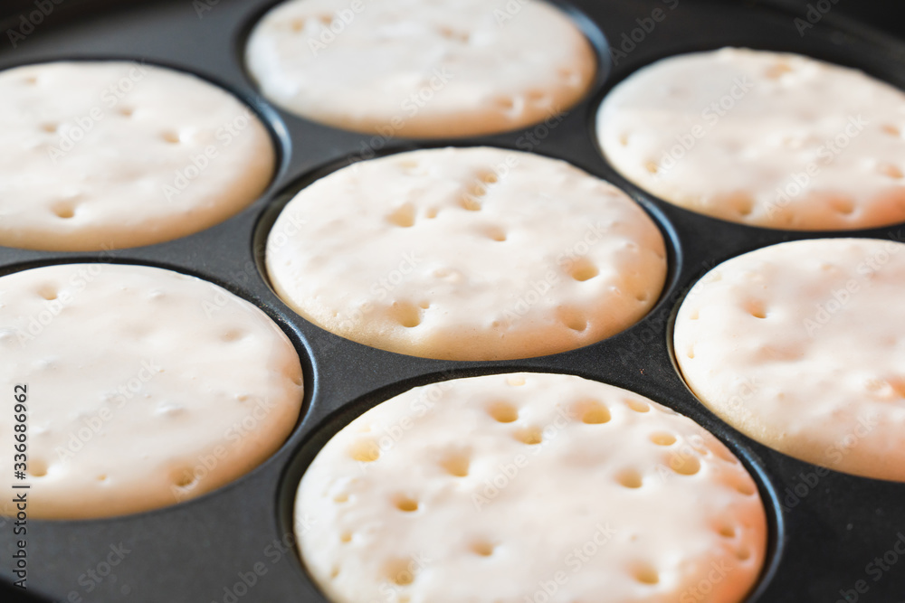 cooking pancakes in a pan . template for the recipe. the process of cooking food cooking pancakes in a pan . template for the recipe. the process of cooking food