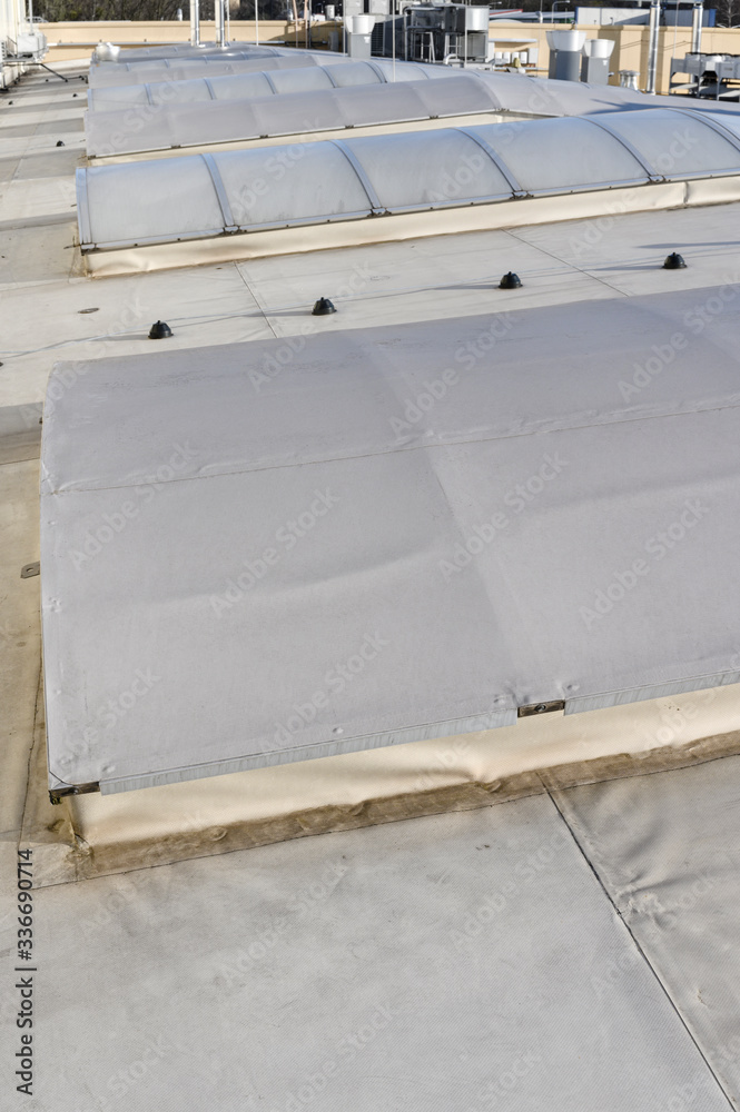Covered front plastic skylight on the roof of the hall.