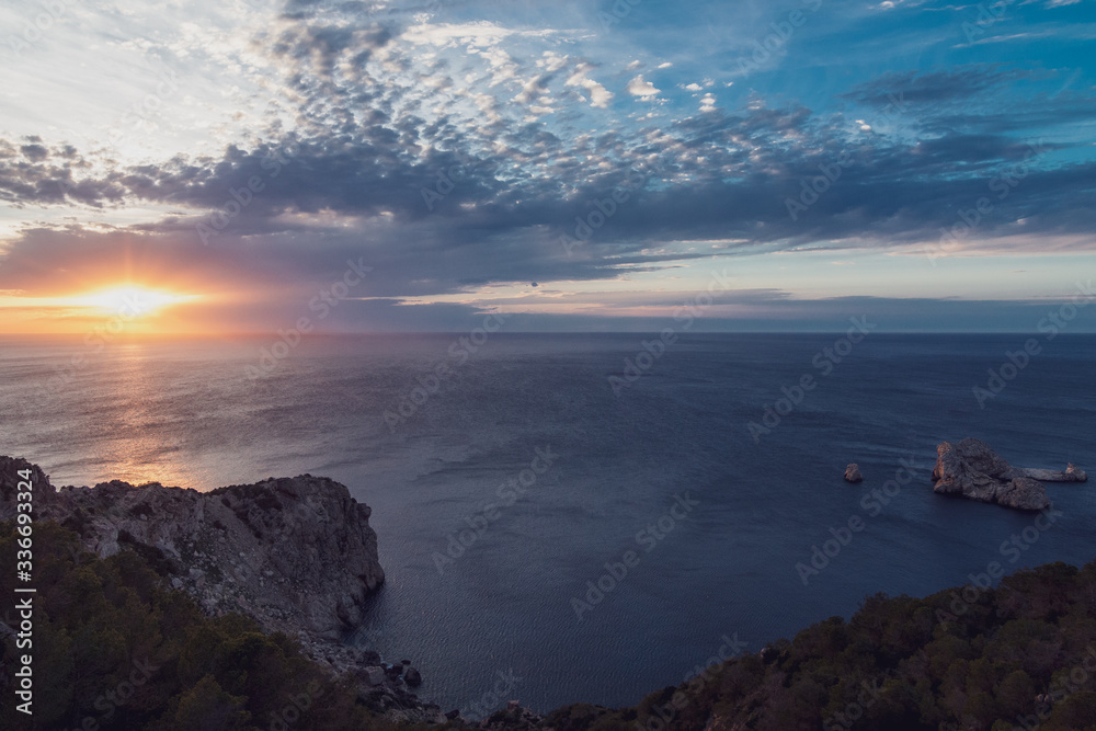Obraz premium Summer sunset, The Gates of Heaven viewpoint , Ibiza, Balearic islands, Spain, Europe