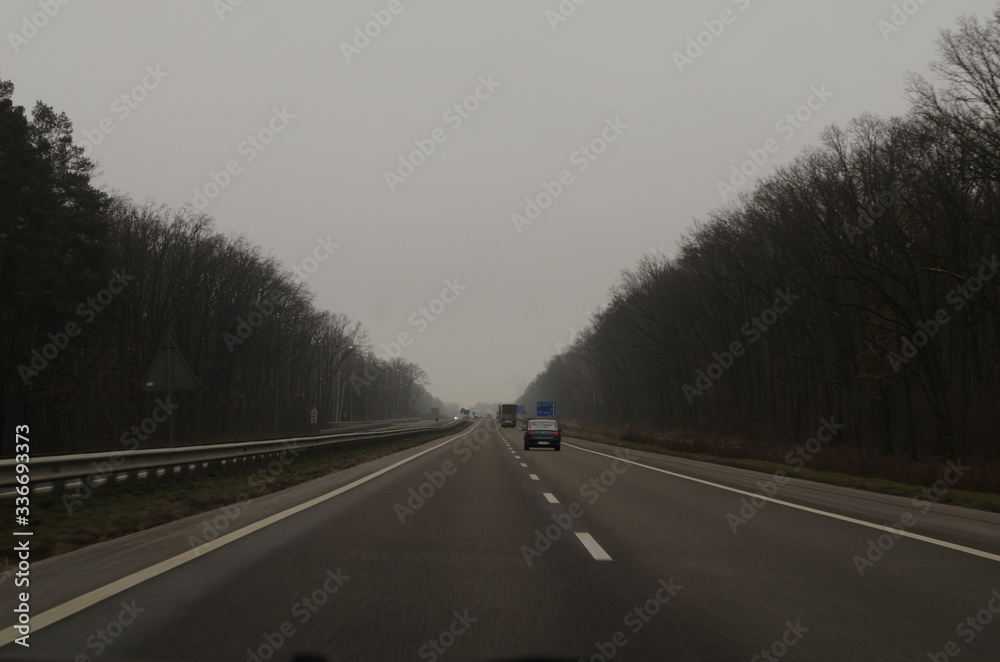 road in the morning fog road in the morning fog