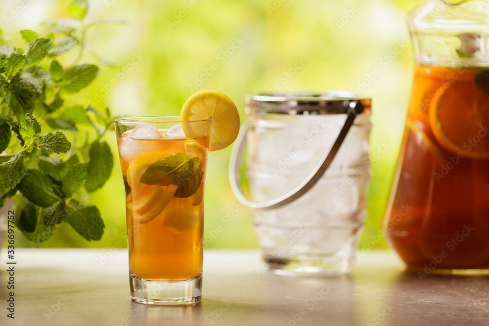 Iced tea with lemon and ice cubes Iced tea with lemon and ice cubes