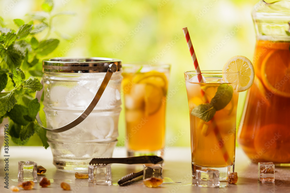 Iced tea with lemon and ice cubes Iced tea with lemon and ice cubes