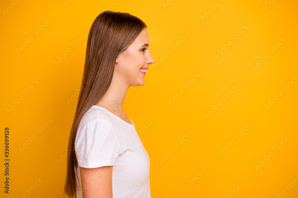 Profile side photo of lovely pretty girl look copyspace listen her friends enjoy spring weekend holiday isolated over vivid color background Profile side photo of lovely pretty girl look copyspace listen her friends enjoy spring weekend holiday isolated over vivid color background