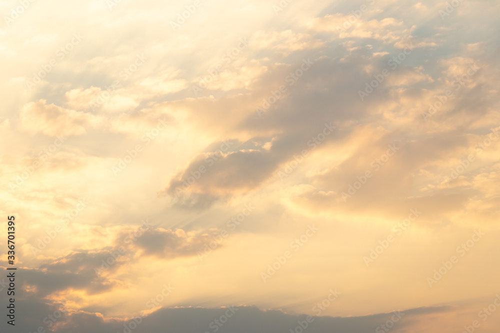Fototapeta premium Beautiful orange color light sky with cloud background from sunset