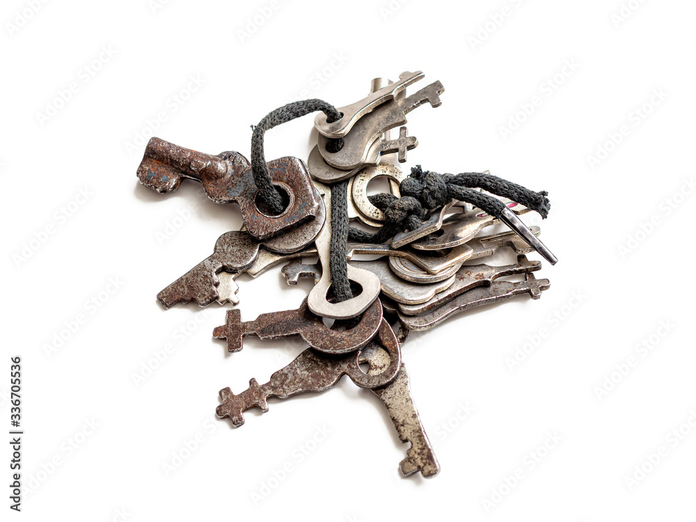 Bunch of old, partially rusted keys from lost locks Bunch of old, partially rusted keys from lost locks