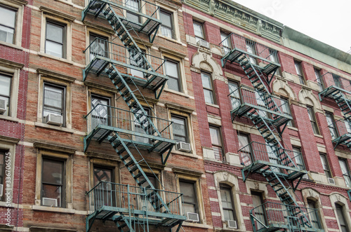 Typical New York City Apartments with Fire Escape Ladders © Nikolaos
