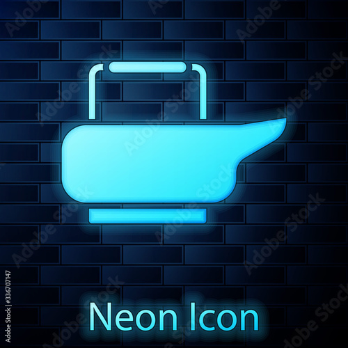 Glowing neon Bedpan icon isolated on brick wall background. Toilet for bedridden patients. Vector Illustration