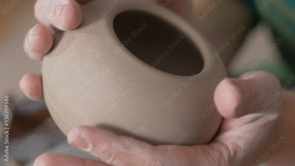 The finished product. Hands of a Potter. Clay without firing. The