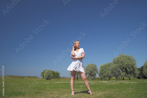Beautiful woman enjoying summer outdoors