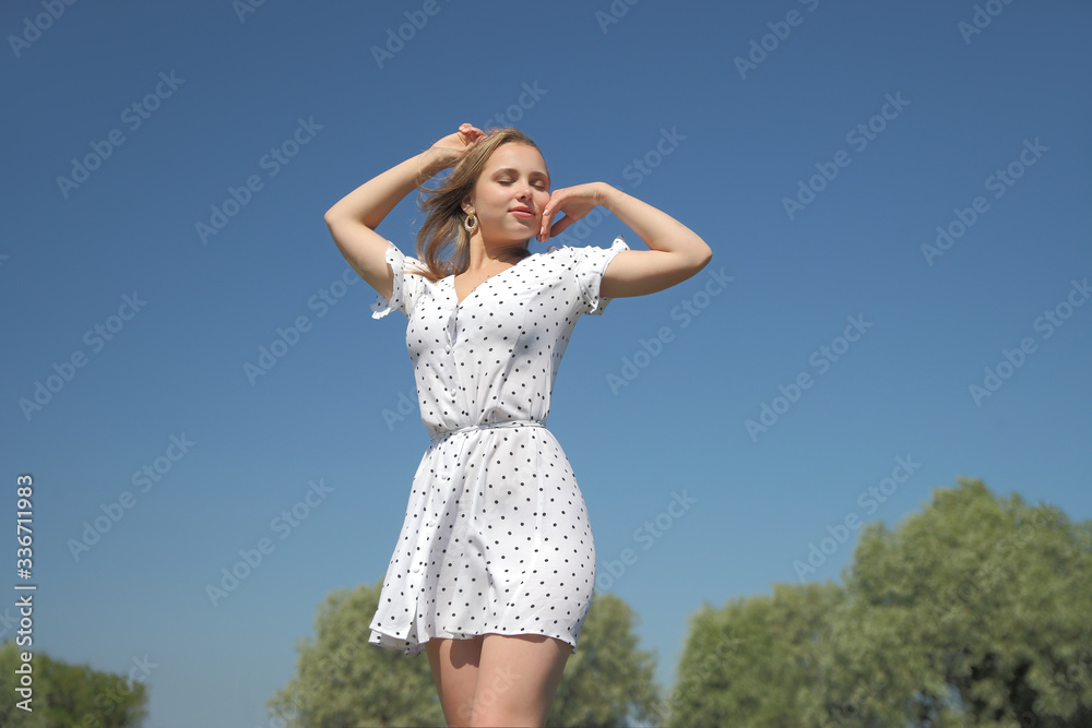 Beautiful woman enjoying summer outdoors Beautiful woman enjoying summer outdoors