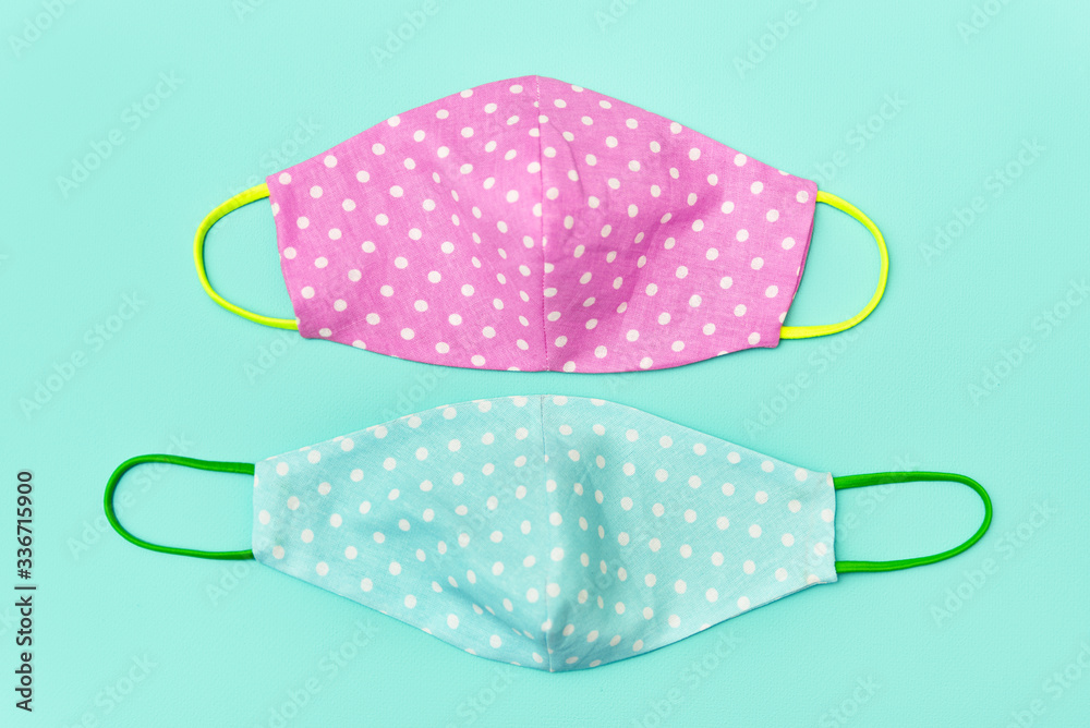 diy reusable face masks for viruses. turquoise background diy reusable face masks for viruses. turquoise background