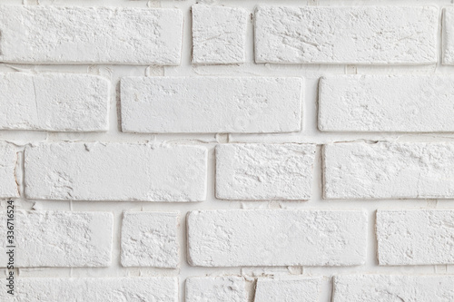background wall of white decorative textured bricks