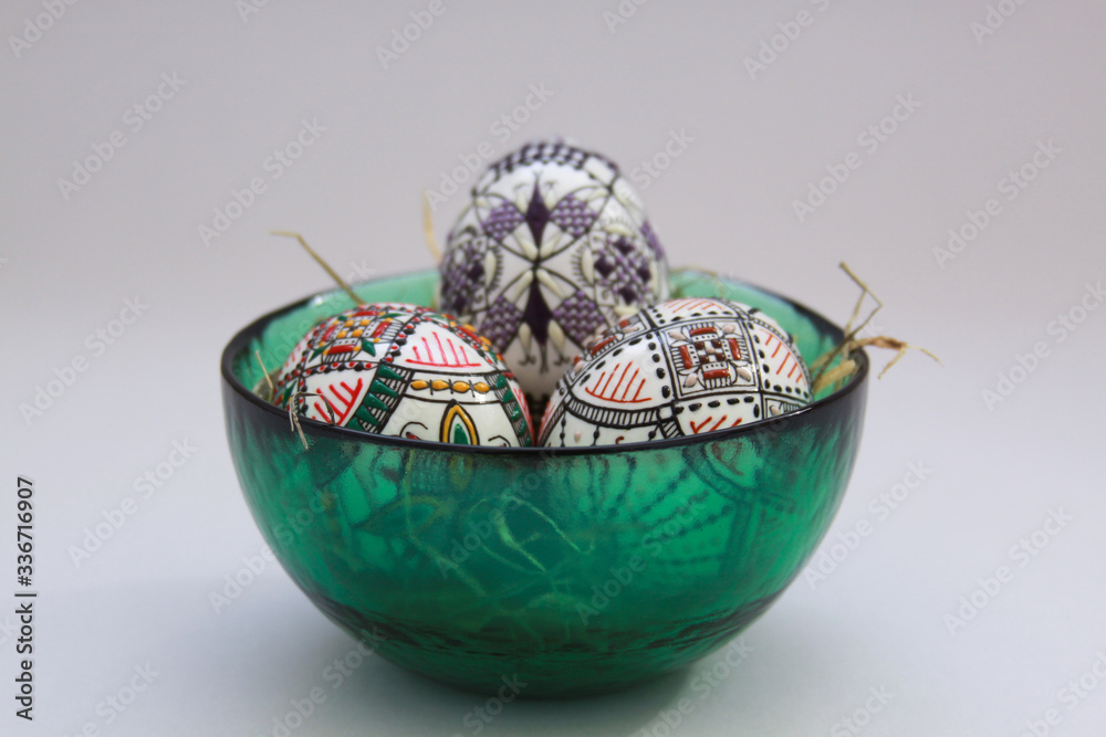 Traditional handmade Easter eggs in glass bowl