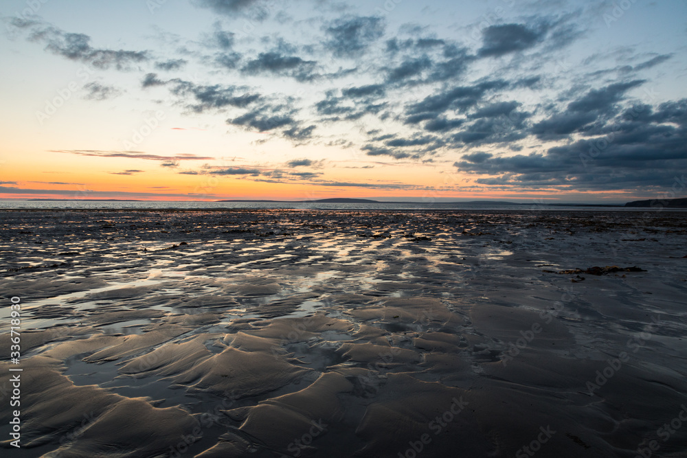 scenic empty beach at sunset  on the west coast of Ireland