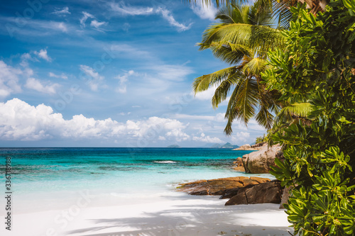 Fototapeta Naklejka Na Ścianę i Meble -  An empty exotic tropical sandy beach on Mahe Island,Seychelles islands. Famous vacation destination in summer season