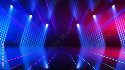 Empty dark abstract background. Background of empty show scene. Glow of neon lights and neon figures on an empty concert stage. Reflection of light on the pavement.