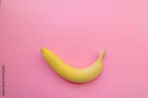 yellow bananas on a pink background