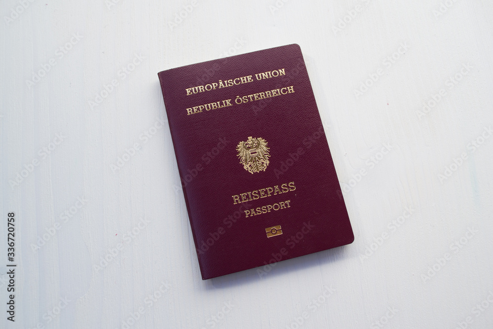 Passport of an Austrian citizen on a white background. Passport of an Austrian citizen on a white background.