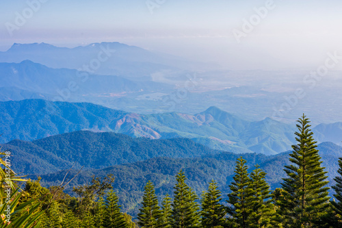 Beautiful mountain landscape with tropical vegetation and a blue sky