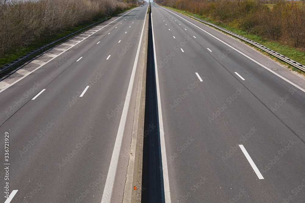 Covid-19 corona virus Lockdown empty roadway to the belgian coast on an April Sunday sunny day in Spring